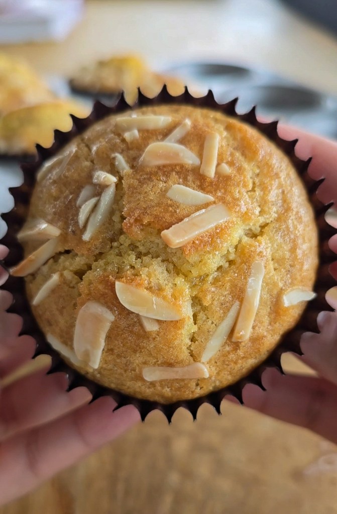 Top of muffin with almonds and frangipane filling