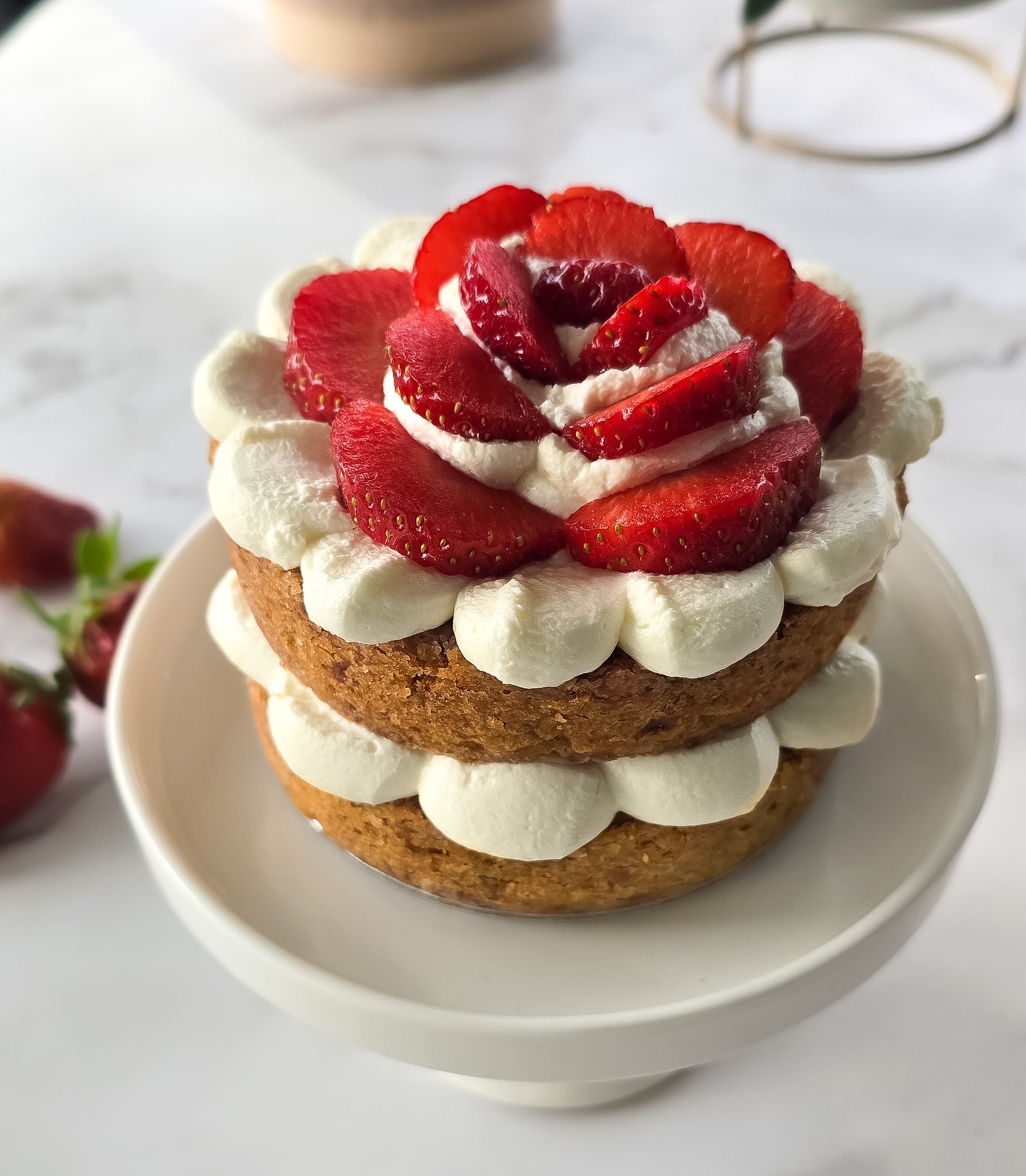 naked mini layer cake with strawberries and cream