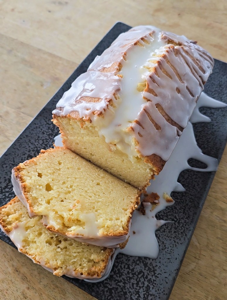 Loaf cake with slices ricotta honey