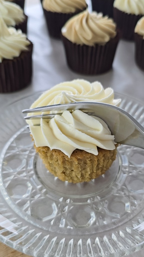 cutting a cupcake in half