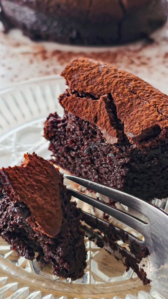 chocolate torte moist crumbs close-up bite cake